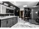 Well-appointed bathroom with marble flooring, a sleek vanity, and a steam shower for relaxation at 6164 Afton Crest, Indianapolis, IN 46220