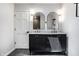 Bathroom featuring double vanity, arched mirrors, and modern fixtures at 6164 Afton Crest, Indianapolis, IN 46220