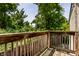 Scenic deck view overlooking lush greenery, offering a tranquil outdoor retreat at 6164 Afton Crest, Indianapolis, IN 46220