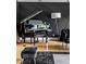 View of a stylish living room featuring a grand piano, hardwood floors, and a floor lamp at 6164 Afton Crest, Indianapolis, IN 46220