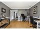 Spacious home office with hardwood floors, neutral paint, and ample workspace at 6164 Afton Crest, Indianapolis, IN 46220