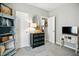 Bedroom featuring neutral walls, and accent cabinet with open view to additional rooms at 6315 Emerald Field Way, Indianapolis, IN 46221