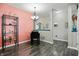 Cozy dining area featuring modern lighting, hardwood floors, and neutral paint tones at 6315 Emerald Field Way, Indianapolis, IN 46221