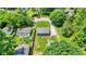 Aerial view highlights the home's location, yard size, detached garages and neighborhood at 6949 Crittenden Ave, Indianapolis, IN 46220