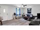 Bright living room features vinyl floors and ample natural light at 6949 Crittenden Ave, Indianapolis, IN 46220