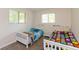 Bright bedroom with two twin beds and natural light at 7139 Buick Dr, Indianapolis, IN 46214