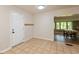 Entryway with tiled floor, coat hooks and access to a dining area at 7139 Buick Dr, Indianapolis, IN 46214