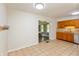 Kitchen with tiled floor and view to a dining area at 7139 Buick Dr, Indianapolis, IN 46214