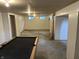 Large basement area featuring a pool table and ample space for customization at 737 Howard St, Shelbyville, IN 46176