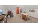 Attic bonus room featuring neutral carpet, angled ceiling, and built in storage space at 7612 Freedom Woods Dr, Indianapolis, IN 46259