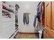 Organized walk-in closet with custom shelving and ample storage space for clothes and accessories at 7612 Freedom Woods Dr, Indianapolis, IN 46259
