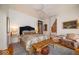 Comfortable bedroom featuring stylish decor, warm lighting, and a cozy rug at 7728 W 200 S, New Palestine, IN 46163