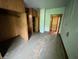 Bedroom showcasing built-in wood cabinets and natural light from the window at 807 N Elm St, Muncie, IN 47305