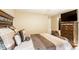 Well-decorated bedroom with a large headboard and coordinating furnishings at 8116 Harshaw Dr, Indianapolis, IN 46239