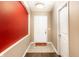 Welcoming entryway featuring tile flooring and a pop of color on an accent wall at 8116 Harshaw Dr, Indianapolis, IN 46239