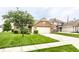 Beautiful brick home with manicured lawn and concrete driveway at 8116 Harshaw Dr, Indianapolis, IN 46239