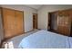Bright bedroom with plush carpet and an adjacent bathroom at 8144 Grassy Meadow Cir, Indianapolis, IN 46259