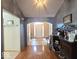 Open foyer with hardwood floors, archway, and view of the front door at 8144 Grassy Meadow Cir, Indianapolis, IN 46259