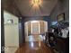 Open foyer with hardwood floors, archway, and view of the front door at 8144 Grassy Meadow Cir, Indianapolis, IN 46259