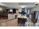 Bright kitchen featuring an island, stainless steel appliances, and modern white cabinetry at 8144 Grassy Meadow Cir, Indianapolis, IN 46259