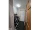 Laundry room with washer and dryer and white cabinet storage at 8144 Grassy Meadow Cir, Indianapolis, IN 46259