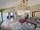 Spacious living room boasts hardwood floors and seamless access to a stylish and private office at 8144 Grassy Meadow Cir, Indianapolis, IN 46259