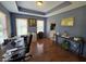 Comfortable home office features hardwood floors, neutral tones, and natural light at 8144 Grassy Meadow Cir, Indianapolis, IN 46259