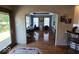 Bright home office with a door to the deck and large windows providing natural light at 8144 Grassy Meadow Cir, Indianapolis, IN 46259