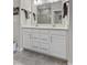 Modern bathroom featuring double sinks, quartz countertop and updated fixtures at 820 Elise Dr, Westfield, IN 46074