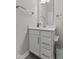 Well-lit bathroom featuring a clean white vanity with modern silver fixtures at 820 Elise Dr, Westfield, IN 46074