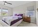 Comfortable bedroom with neutral colors, a ceiling fan, and carpet flooring at 820 Elise Dr, Westfield, IN 46074