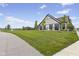 Community center with outdoor seating, complemented by a lush lawn and walking path at 820 Elise Dr, Westfield, IN 46074