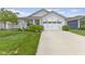 Charming single-story home featuring a well-manicured lawn and a two-car garage with white exterior at 820 Elise Dr, Westfield, IN 46074