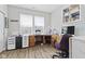 Sunlit office with custom cabinetry, drawers, and shelving units for storage at 820 Elise Dr, Westfield, IN 46074