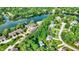 Aerial shot capturing the community, water and tree-lined streets, highlighting the neighborhood's appeal at 8261 Twin Pointe Cir, Indianapolis, IN 46236