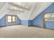 A large bedroom offers natural light with a textured ceiling and neutral carpet at 8261 Twin Pointe Cir, Indianapolis, IN 46236
