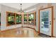 Sun-drenched breakfast nook with a bay window and views of the outdoor space at 8261 Twin Pointe Cir, Indianapolis, IN 46236