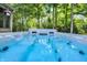 Close up of a relaxing hot tub with crystal clear blue water and jets at 8261 Twin Pointe Cir, Indianapolis, IN 46236