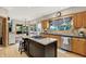 Well-appointed kitchen with a center island, stainless appliances, and a breakfast nook at 8261 Twin Pointe Cir, Indianapolis, IN 46236