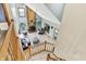 Aerial view of a spacious living room with brick fireplace and comfortable seating area at 8261 Twin Pointe Cir, Indianapolis, IN 46236