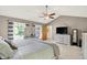 Main bedroom with vaulted ceilings, natural light, and modern decor at 8261 Twin Pointe Cir, Indianapolis, IN 46236