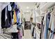 Spacious walk-in closet with custom shelving and organized storage, providing ample space for clothing and accessories at 8261 Twin Pointe Cir, Indianapolis, IN 46236