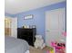 Bedroom with decor and closet access at 8720 N Deer Crossing Blvd, McCordsville, IN 46055