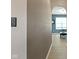 Hallway with an arched entrance leading to a light-filled room, showcasing a clean and modern design at 8720 N Deer Crossing Blvd, McCordsville, IN 46055