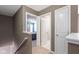 Hallway with carpet floors and door to bedroom at 8720 N Deer Crossing Blvd, McCordsville, IN 46055