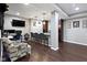 Entertaining basement with a stylish bar area, comfortable seating, and a large-screen TV at 8720 N Deer Crossing Blvd, McCordsville, IN 46055