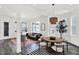 Inviting living space with modern furnishings, open layout, large windows and stylish decor at 920 Veterans Way # 204, Carmel, IN 46032