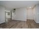 Open entryway with wood-look floors, neutral walls, and a view of the staircase at 10420 Day Star Dr, Indianapolis, IN 46234