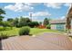Lovely deck overlooking a lush backyard with mature trees at 10444 Indian Lake N Blvd, Indianapolis, IN 46236