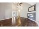 Spacious living room featuring a modern fireplace, high ceilings, and hardwood floors at 10444 Indian Lake N Blvd, Indianapolis, IN 46236